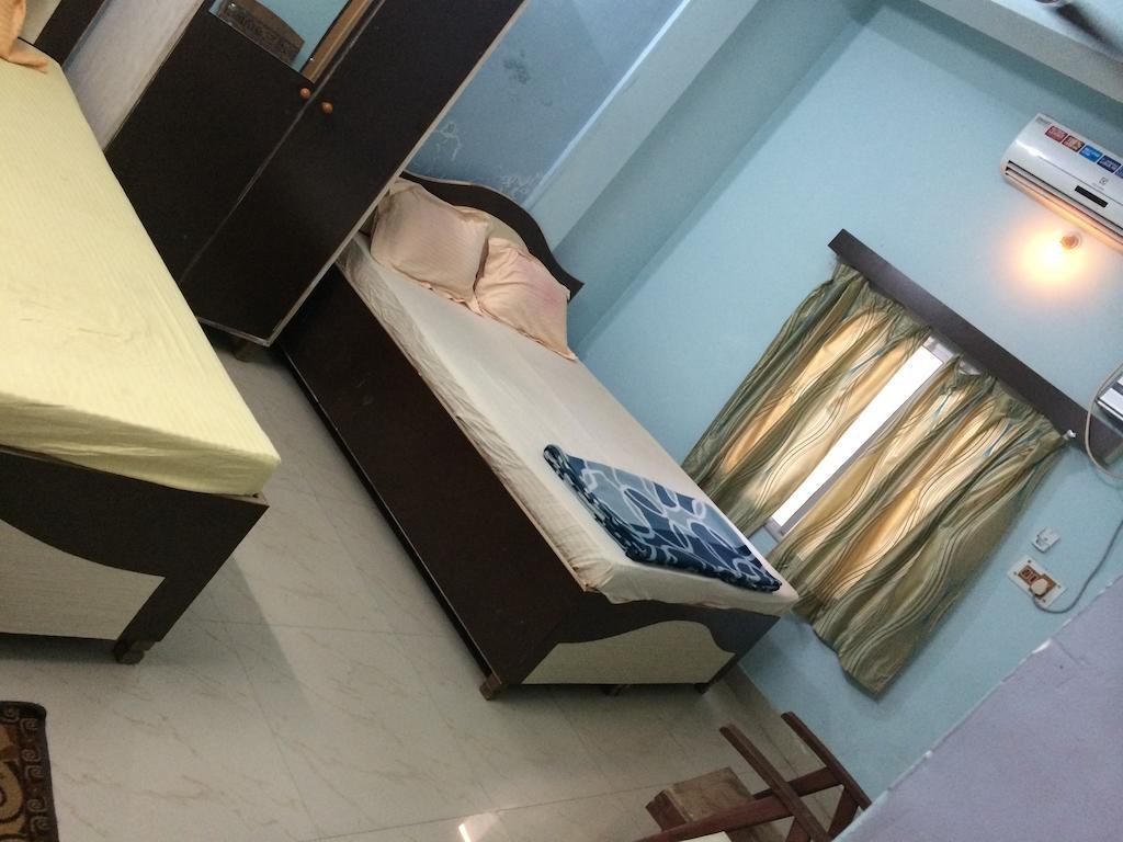 Hotel Pragya International Варанасі Номер фото